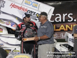 Don Mack presenting Kraig Kinser with trophy at The Bullring River Cities Speedway